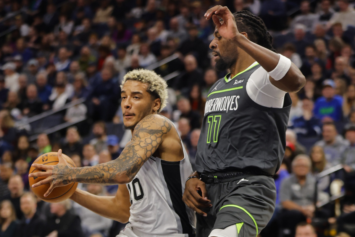 San Antonio Spurs forward Jeremy Sochan (10) works around Minnesota Timberwolves center Naz Reid (11) in the second quarter at Target Center.